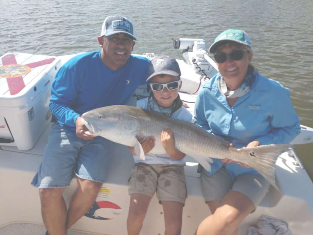 Ponce Inlet fishing scene capturing the latest fishing reports from New Smyrna Beach